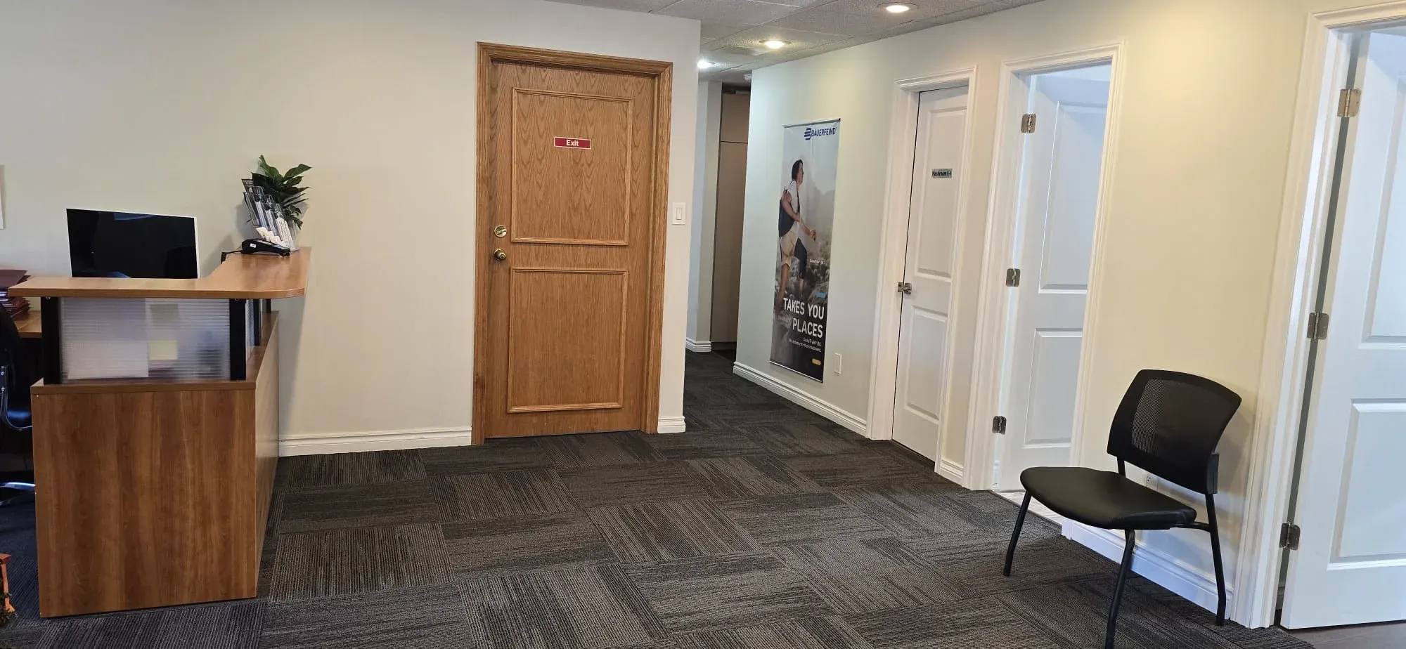 Reception desk and clinic hallway at Physiotrust