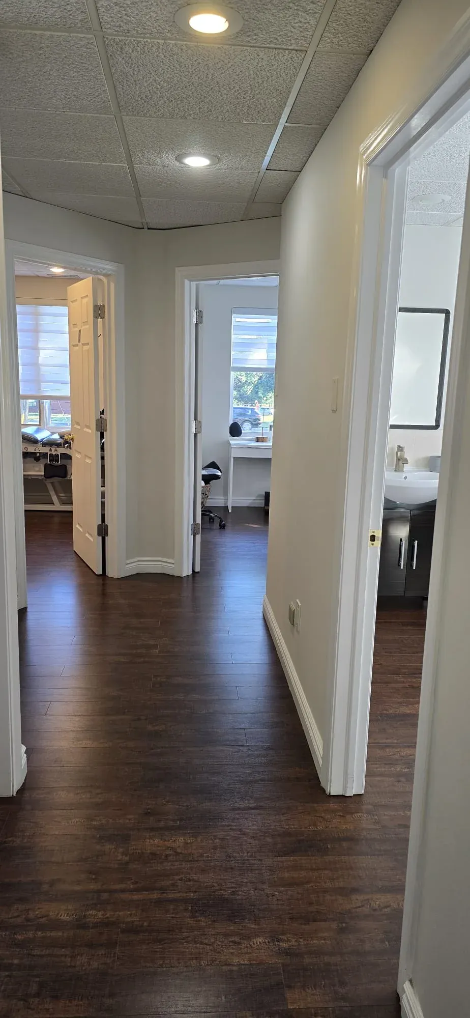 Hallway leading to private treatment rooms at Physiotrust